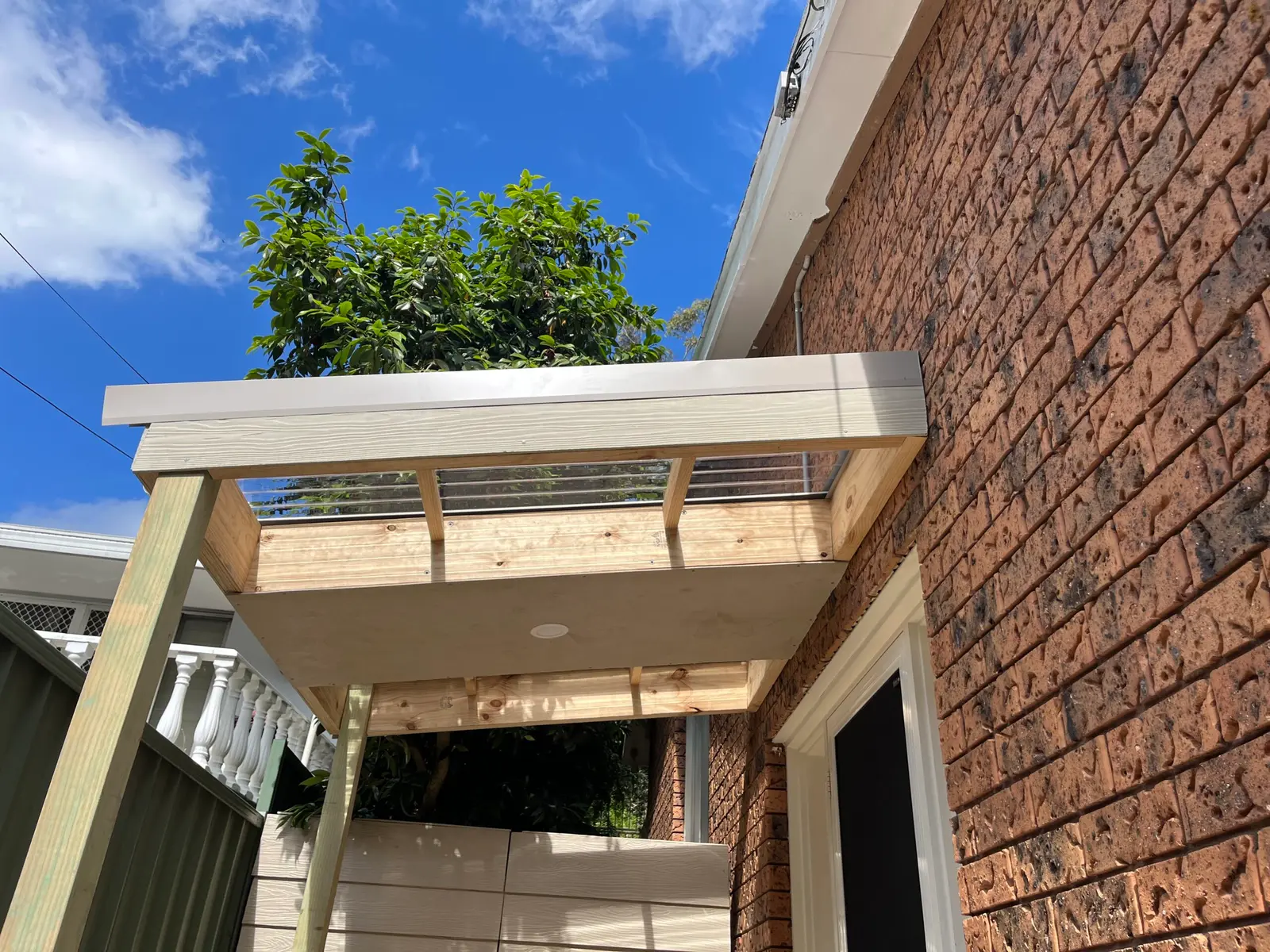 Timber pergola under construction