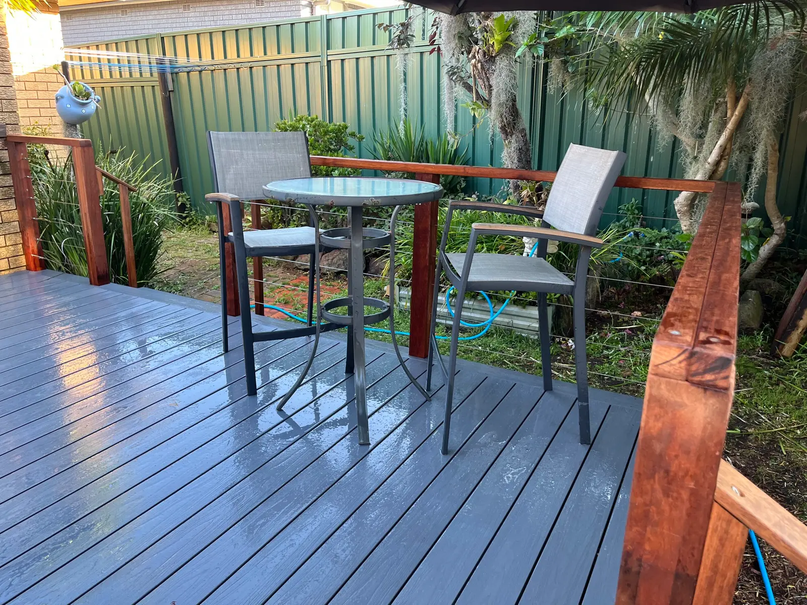 Charcoal composite deck with outdoor setting
