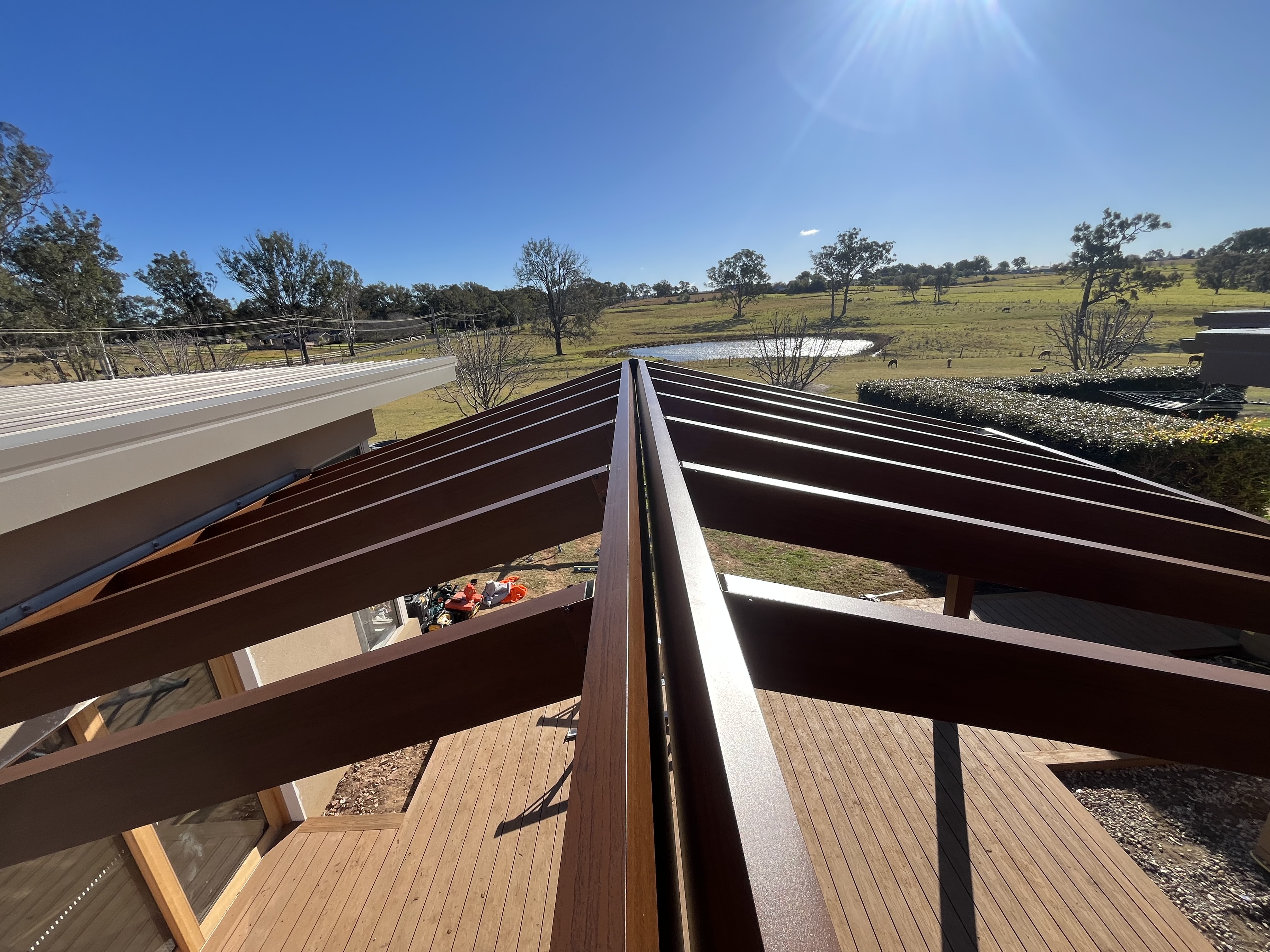 Pergola ridge over a new deck